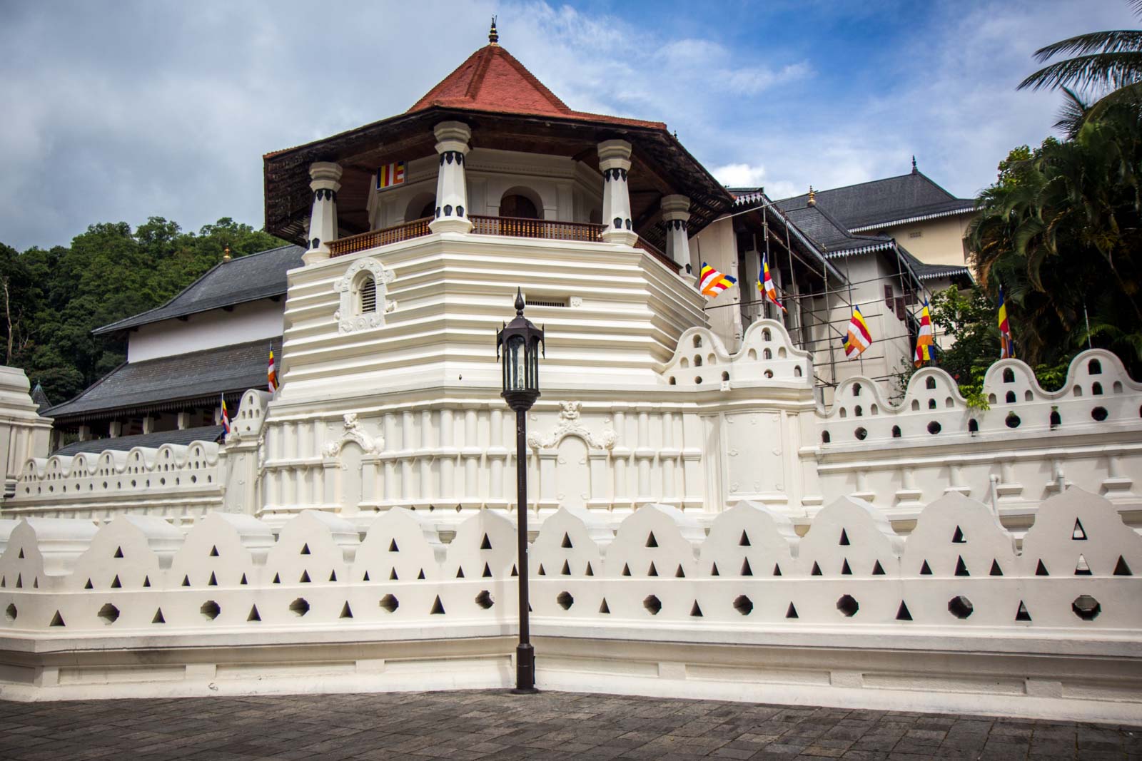 Kandy City Tour: Kataragama Devalaya Temple, Peradeniya Botanical Garden, Temple of the Tooth Relic, and Kandyan Cultural Dance Show.