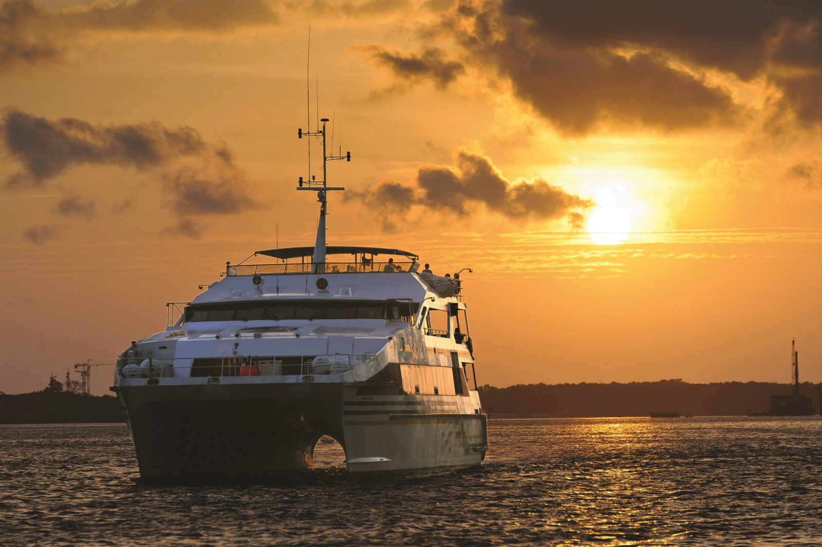 Experience a Sunset Dinner Cruise With Live Cabaret Show by Bali Hai with shared transfers