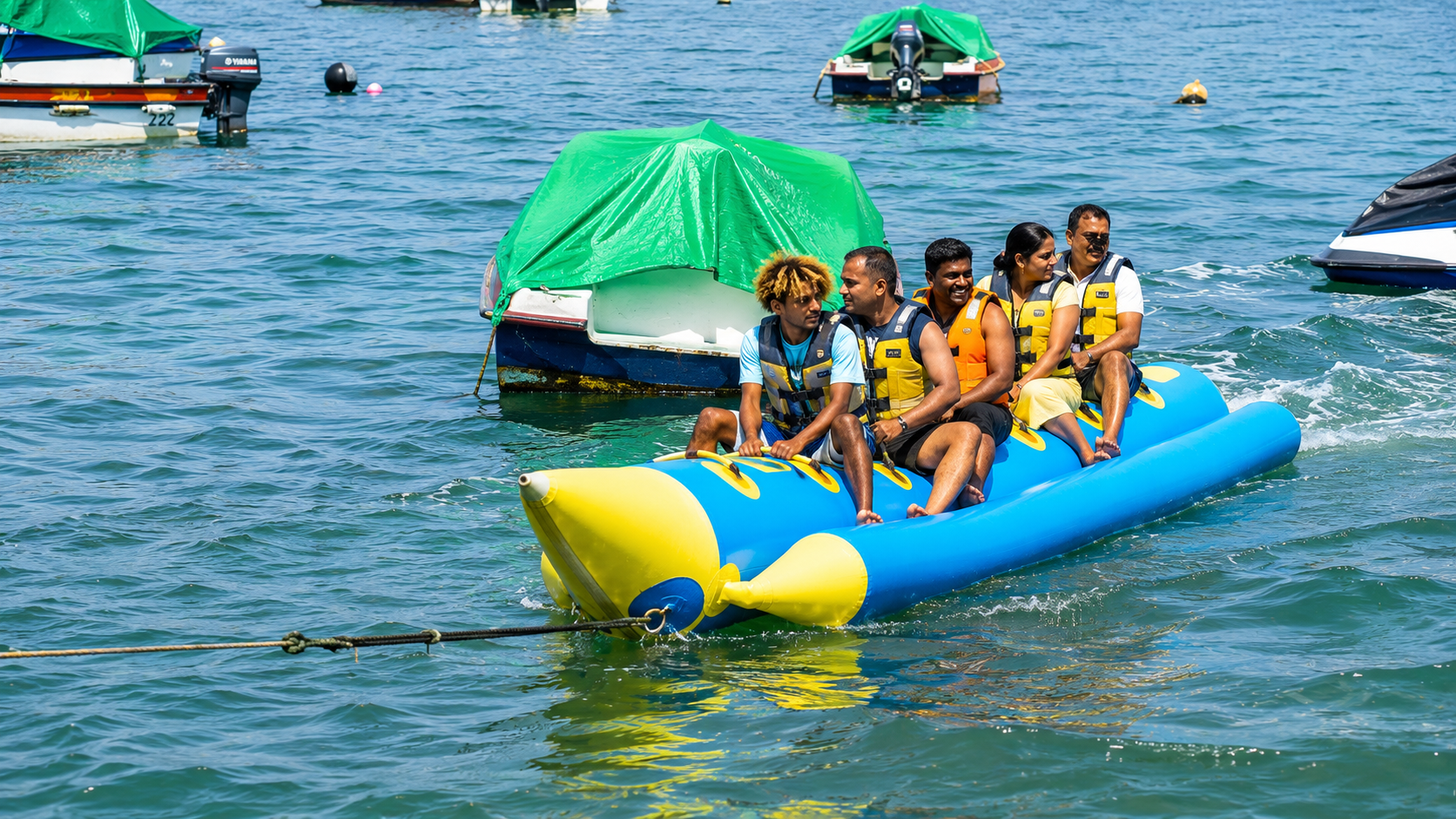 Parasailing, Banana Boat and Jet Ski Adventure with Indian Lunch (Shared Transfers)