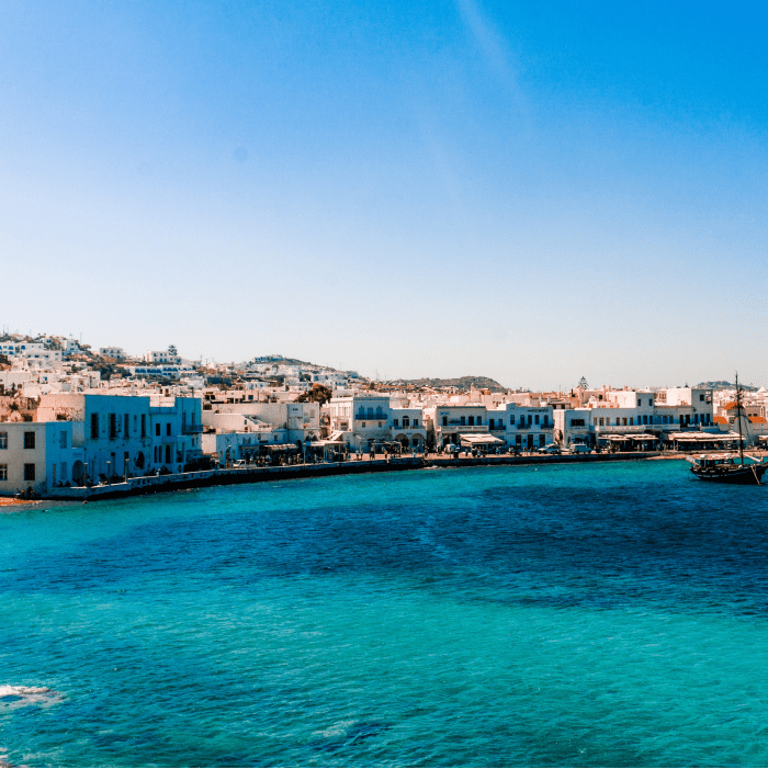 Rediscover romance under the golden skies of Athens, Mykonos and Santorini